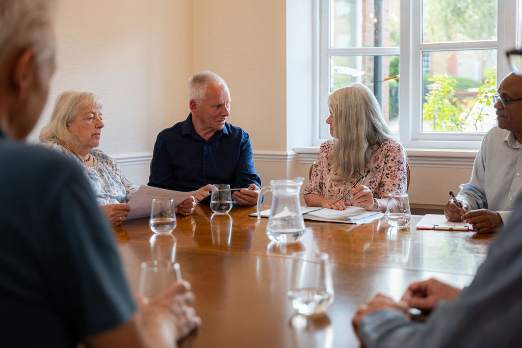 A meeting of the Residents Association in the boardroom