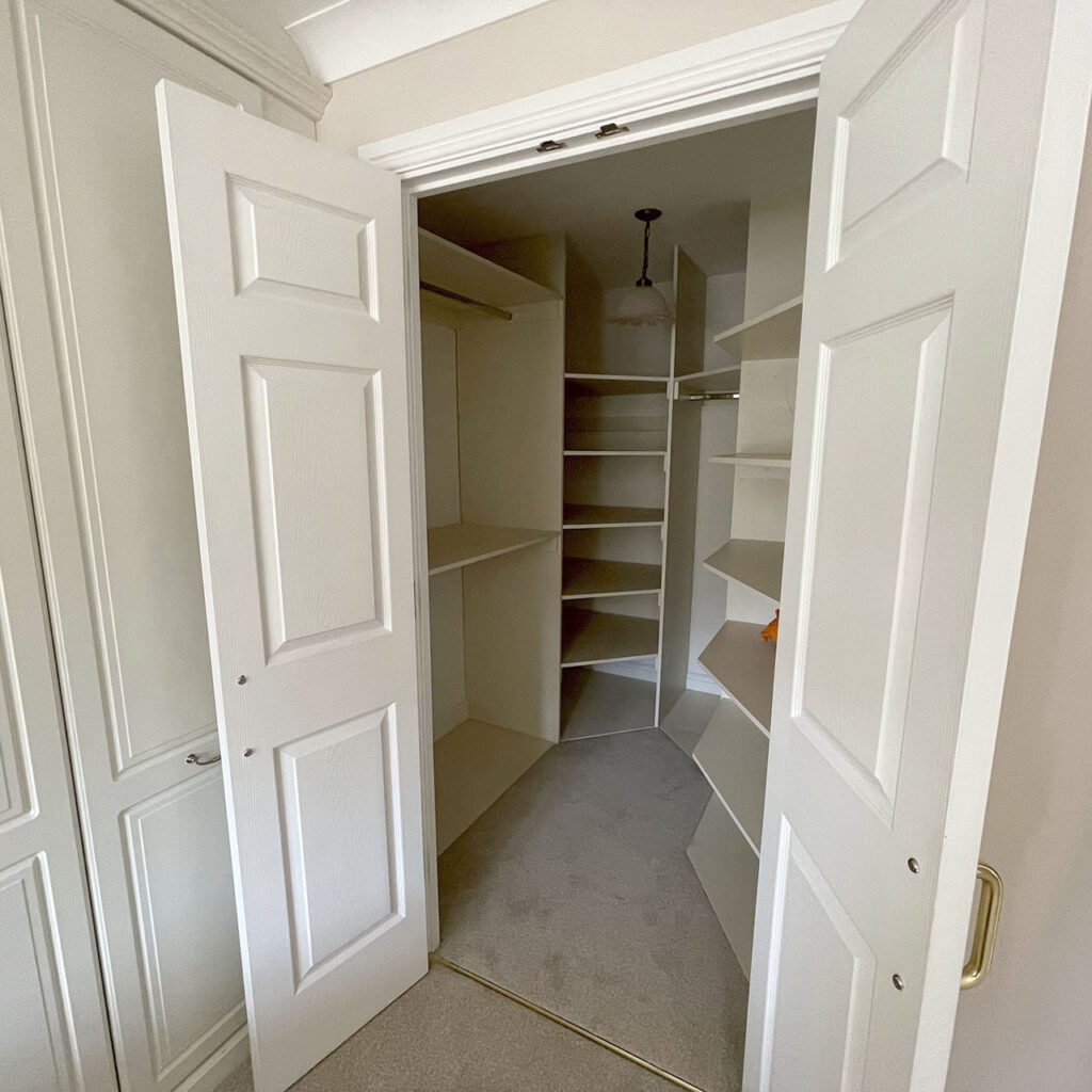 Walk-in wardrobe in first floor apartment at Blake Court