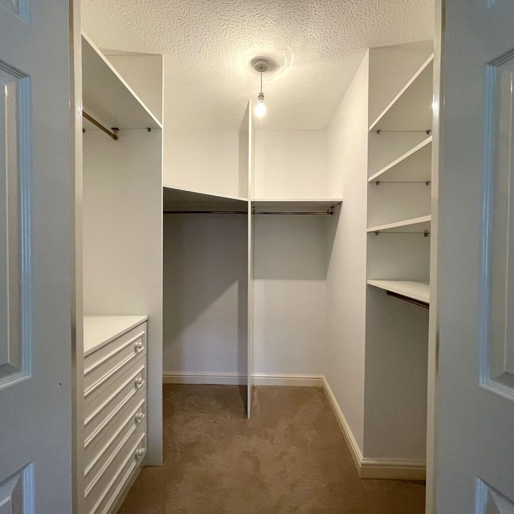 Walk in wardrobe in ground floor apartment at Blake Court